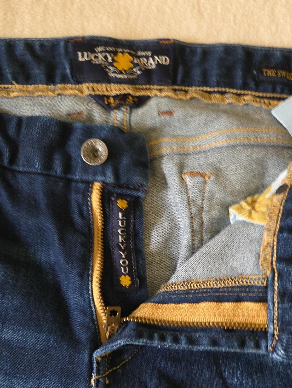 Lucky Brand Women’s Dark Blue Slim Jeans with Gold Stitching